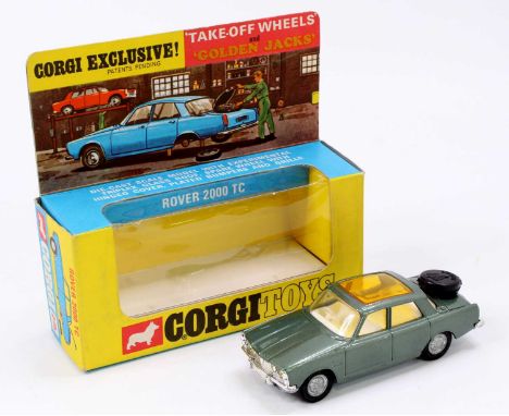 Corgi Toys, 275 Rover 2000TC green body, amber roof panel, rare example with white interior, golden jacks take-off wheels, ho