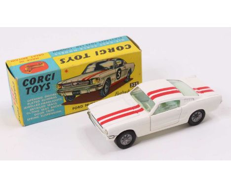 Corgi Toys No. 325 Ford Mustang Fastback 2+2 competition model, comprising of a white body with red twin racing stripe, cast 