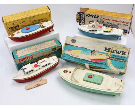 Sutcliffe tinplate and clockwork boat model group of 4 comprising a Hawk speed boat, a Jupiter Ocean Pilot, a Victor Motor To