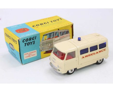 Corgi Toys No. 463 Ambulance, comprising of a cream body with red interior and spun hubs, complete with blue rear glazing and