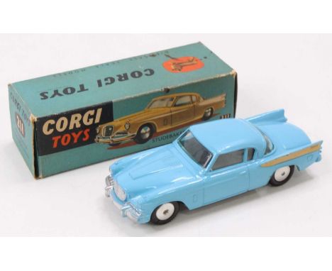 Corgi Toys No. 211 Studebaker Golden Hawk comprising of blue body with spun hubs and rear gold flash, small mark to the bonne