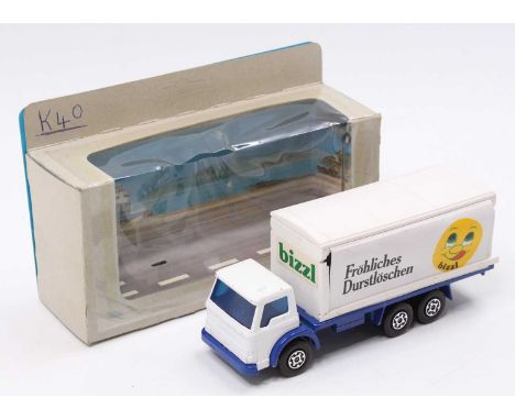 Matchbox Promotional Issue K-40 Ford D series truck, advertising Bizzl, white and blue example with Bizzl livery, housed in a