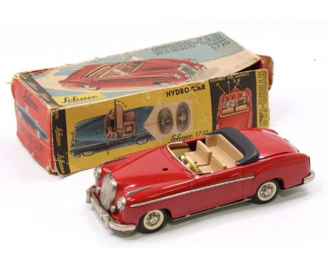 Schuco No. 5720 Electro Hydro-Car tinplate battery operated Mercedes, red body, tan interior &amp; black hood that tilts forw