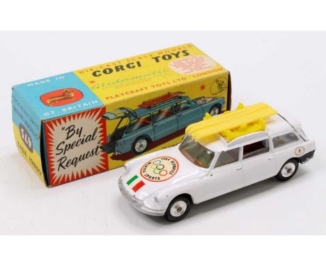 Corgi Toys No. 475 Citroen Safari Olympic Winter Sports Car comprising of a white body with brown and light green interior wi