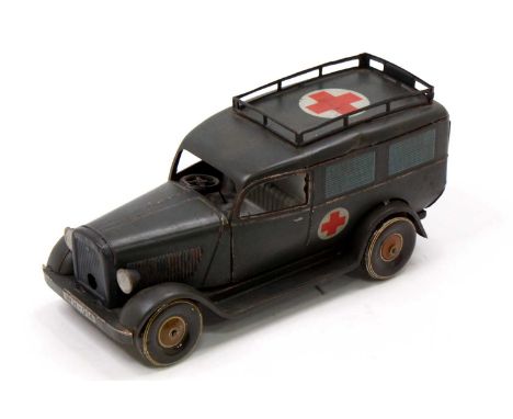 Tipp Co 1930s tinplate and clockwork model of a Military Ambulance, registration wh-914, comprising of green camouflaged body
