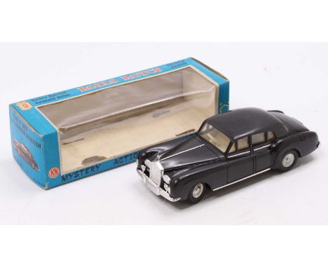 KN Toys Hong Kong No. 666 battery operated Rolls Royce Silver Cloud, black plastic body, with light tan interior, and alumini