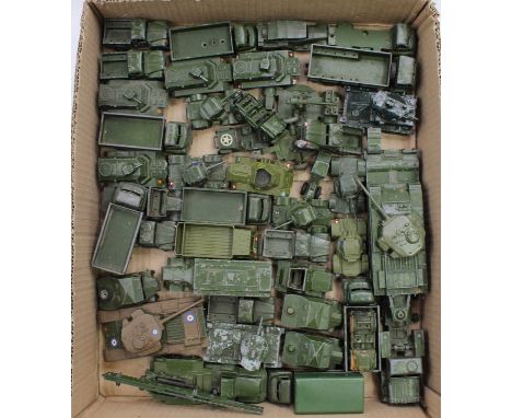 A tray containing a collection of play-worn Dinky Toys military models, with examples including No. 621 3 Ton Army Wagon, No.