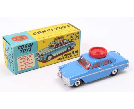 Corgi Toys No. 236 Austin A60 Motor School Car comprising of rare dark blue body with red interior, and spun hubs with workin