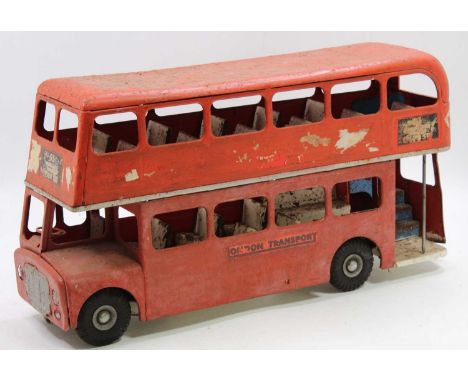 Triang large scale pressed steel model of a London Transport double-decker bus finished in red with a white interior with chr