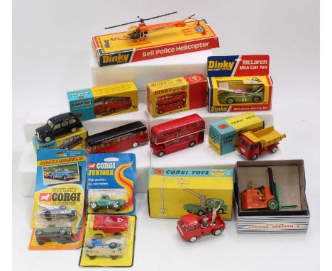 A mixed collection of Dinky and Corgi Toys with examples including a Dinky Toys No. 289 Routemaster London Bus, No. 223 Mclar