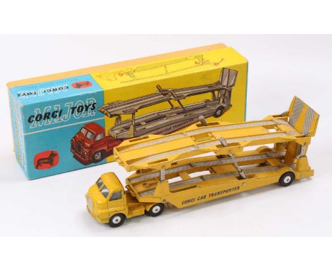 Corgi Toys No. 1101 Bedford Carrimore Car Transporter comprising of yellow cab and chassis with yellow rear trailer fitted wi