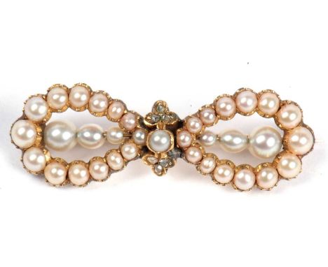 Vintage seed pearl and diamond bow brooch set throughout with graduated seed pearls and highlighted in the centre with six sm