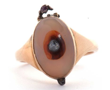 Antique poison ring, the cabochon quartz stone set with a small old cut diamond, the clasp and hinge point highlighted with a