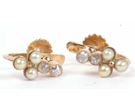 Pair of diamond and seed pearl cluster earrings having three small seed pearls and highlighted with two small old cut diamond