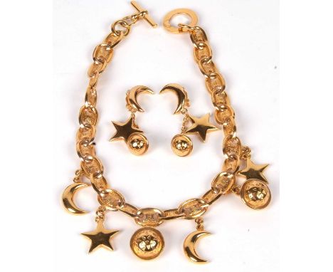 A vintage Celine Paris choker necklace and earrings, planet, star and moon design