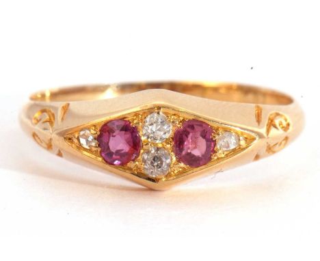 Antique ruby and diamond ring, lozenge shaped, centering two round cut rubies highlighted with four small graduated old cut d