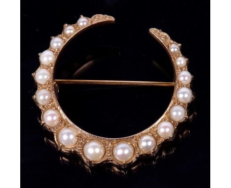 9ct gold and seed pearl crescent shaped brooch set with seventeen graduated seed pearls, hallmarked for London 1966, 3cm in d