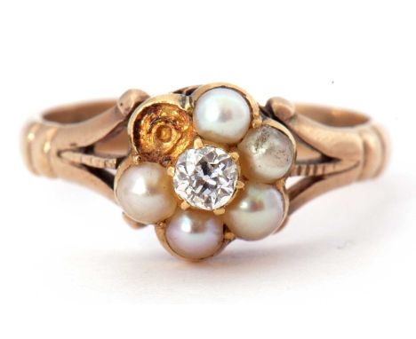 Diamond seed pearl cluster ring, the flower head design centering a small round old cut diamond 0.15ct app, surrounded by fiv