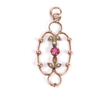 Open work pendant centering a small round ruby between seed pearl highlighted leaves (one missing), all in a beaded decorated
