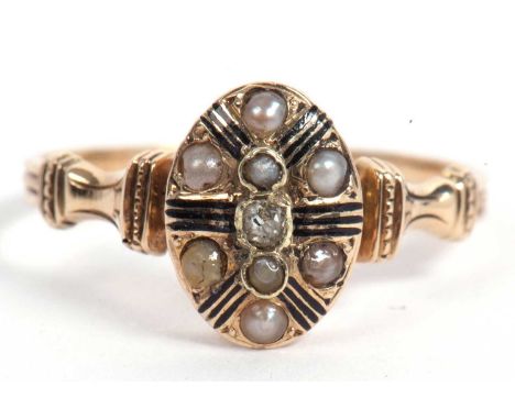 Pearl and diamond ring, the oval shaped plaque 9x7mm centering a small old cut diamond between two small sea pearls, further 
