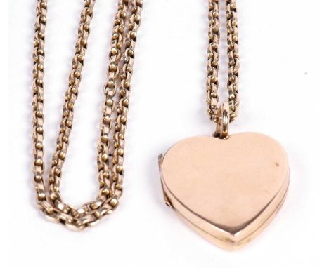 9ct gold heart shaped hinged locket, a plain polished design and hallmarked for Birmingham 1906, suspended from an oval link 