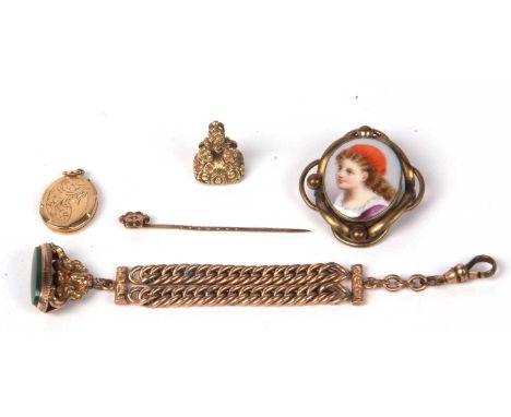 Mixed Lot: Victorian porcelain hand painted brooch in a gilt metal mount, a 9ct gold back and front locket, a 15ct marked tie