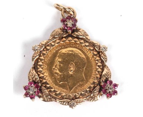George V half sovereign dated 1911 framed in a ruby and diamond pendant mount, g/w 7.5gms