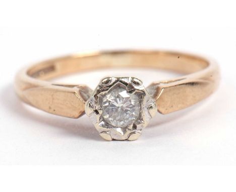 9ct gold single stone diamond ring, the small round brilliant cut diamond illusion set and raised between plain polished shou