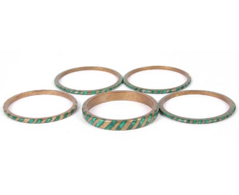 Group of five vintage brass and malacite inlaid bangles (one with a piece missing)
