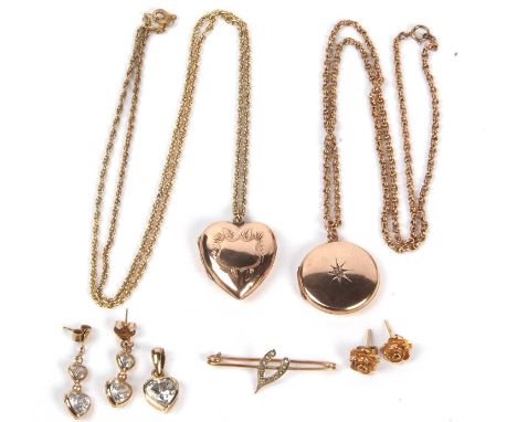 Mixed Lot: Two lockets, a heart and a circular shaped example stamped 9ct back and front, one suspended from a 9ct marked cha