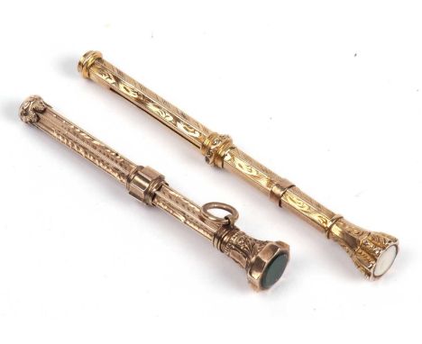 Two vintage gold cased retractable pencils, both chased and engraved detail (2)