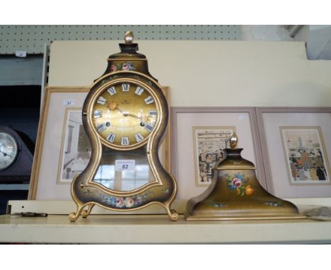A reproduction French style bracket clock with bracket.