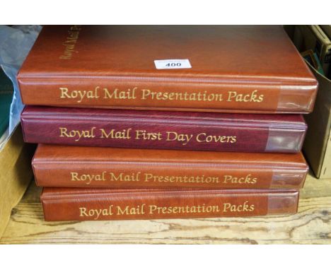 Four albums of Royal Mail presentation first day covers.   CONDITION REPORT:  approx 50 packs per album