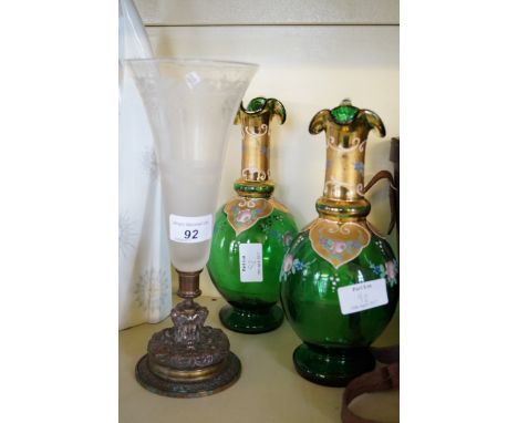 A 19th Century French vase with frosted glass section, a pair of Bohemian green glass jugs and a carved nut cracker.