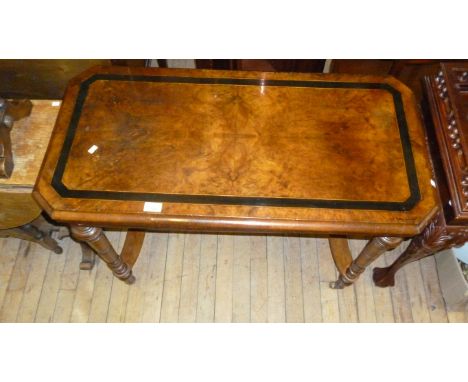 A Victorian burr walnut fold over card table raised on column support.