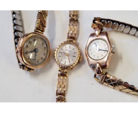 Three ladies manual wind wristwatchesOf various designs, one to a 9ct gold bracelet strap, the other to expandable straps (3)