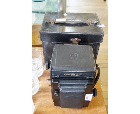 A Junior Special plate camera fitted in original carrying case.