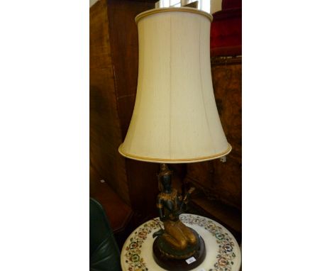 A reproduction Sino Tibetan style table lamp