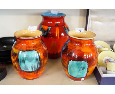 Three contemporary Poole Pottery vases in a Gemstone pattern.