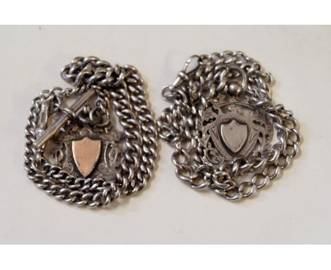 Two silver Albert chainsWith T-bar and fobs , together with a continental bangle, Gold plated, possibly elephant hair