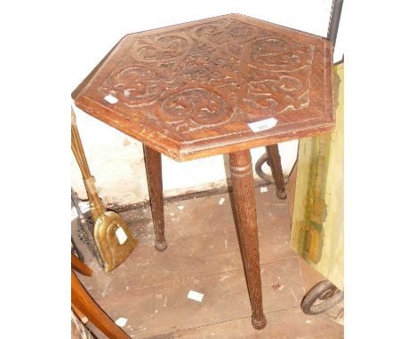 Edwardian carved oak occasional table on tripod legs