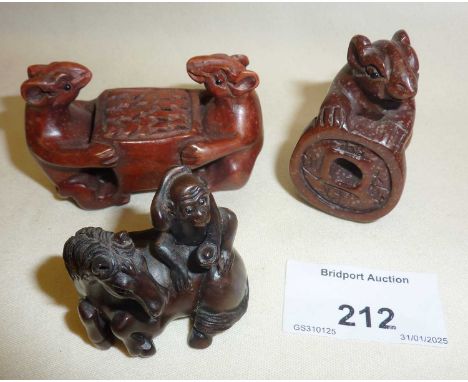 Carved wooden horse netsuke and two other similar animal figurines