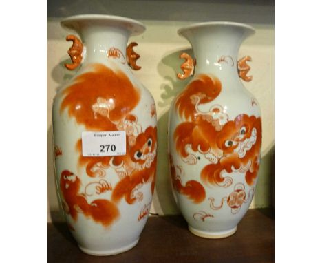 Pair of Chinese Republic vases with iron red Foo dog decoration &amp; calligraphy on back and character marks to base, 23 cms