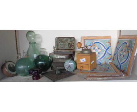 Miscellaneous items inc. glass fishing net floats, large wall tiles, cast iron sundial by Barkers Optical Dept, Kensington, e