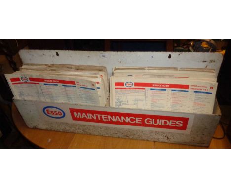 Vintage Esso service guides for all makes of cars in original tin rack