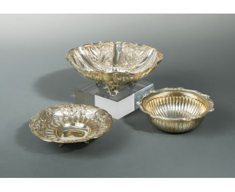 the first, stamped '925' together with maker's number, of circular bowl shaped form with gadrooned sides and an applied scrol
