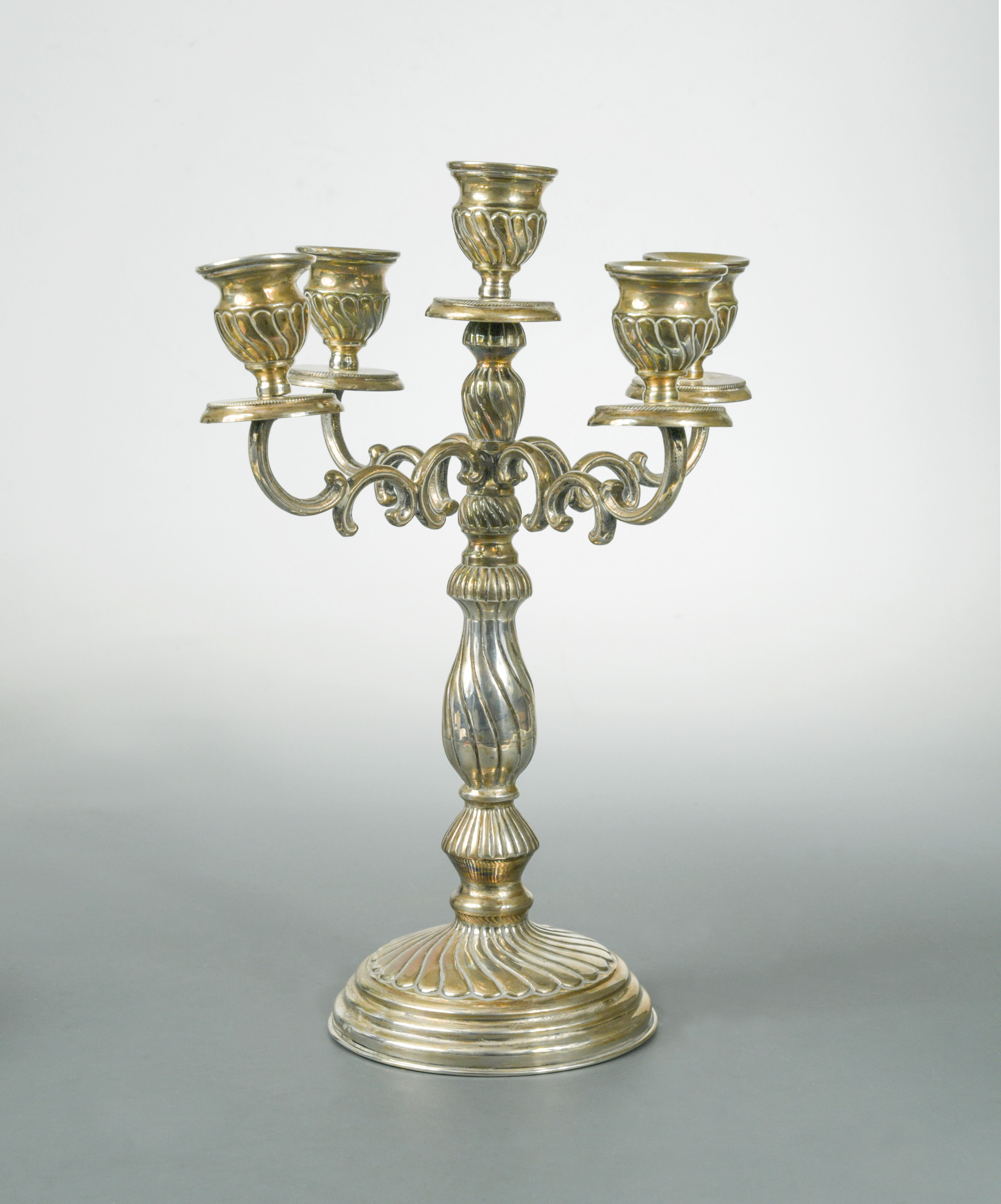 A Greek metalwares four branch five light candelabra, in - Cheffins ...