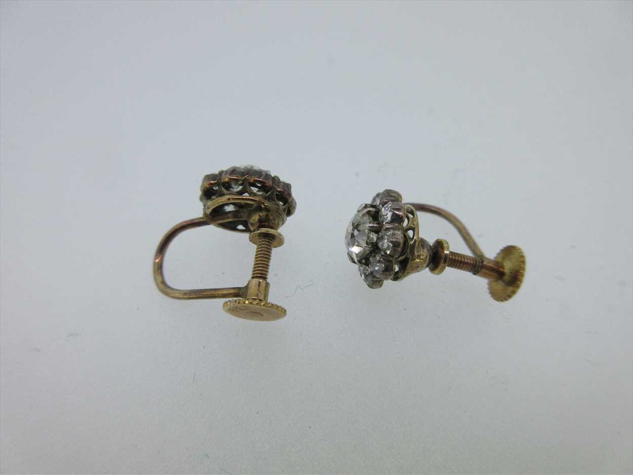 A pair of diamond cluster screw back earrings, in Cheffins Fine Art