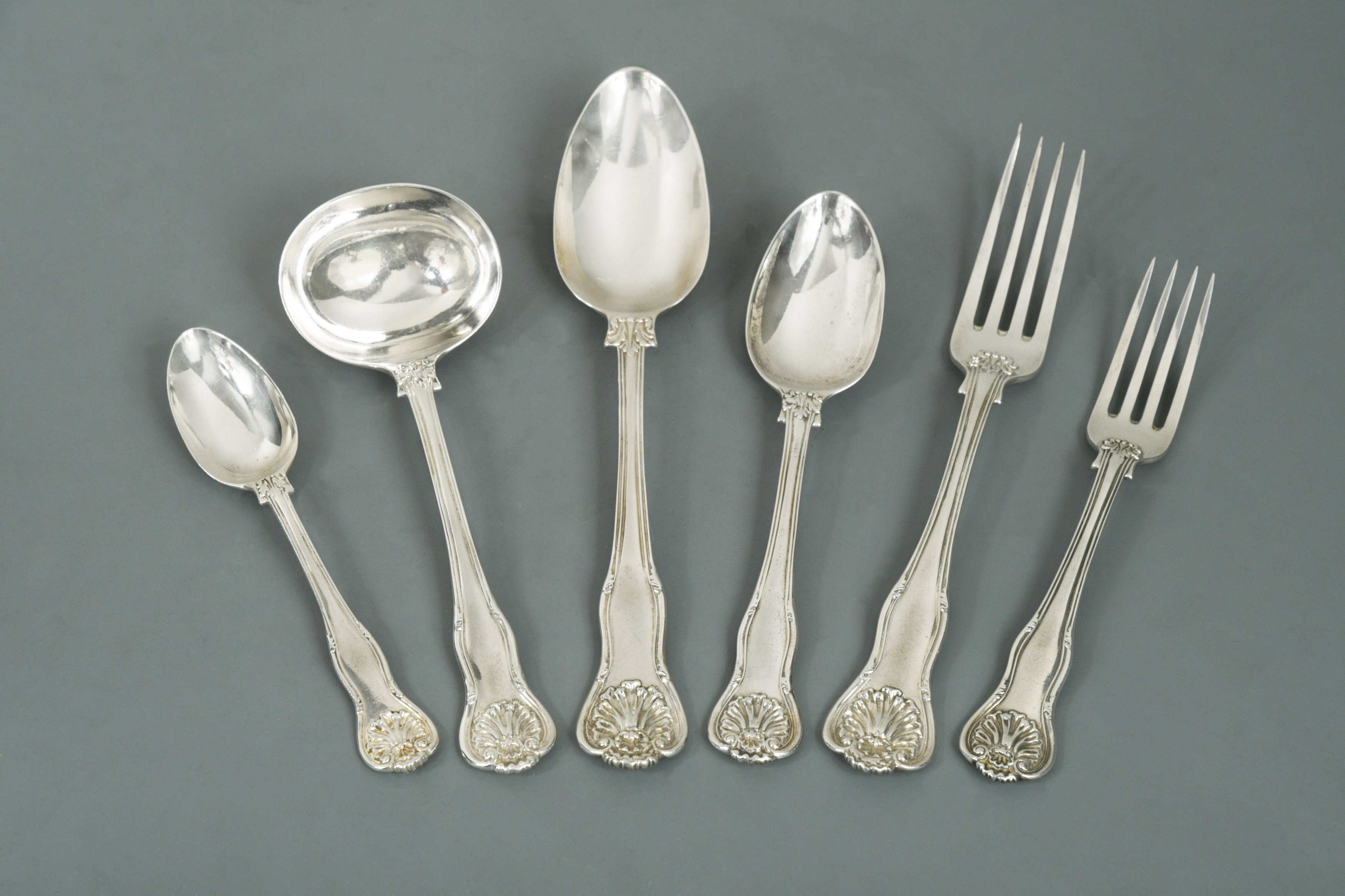 A 39 piece set of Victorian silver flatware with 13 additions, in