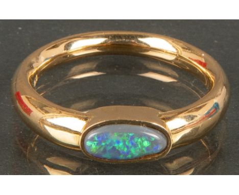 Damenring. 18 ct Gold, ca. 7 g, besetzt mit Opal. Original-Rechnung von Juwelier Faulhaber vom 07.09.99 über DM 1.130,00 lieg